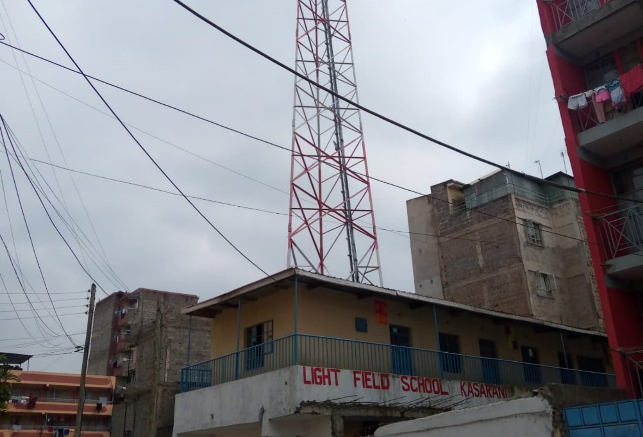 City buildings and a network mast